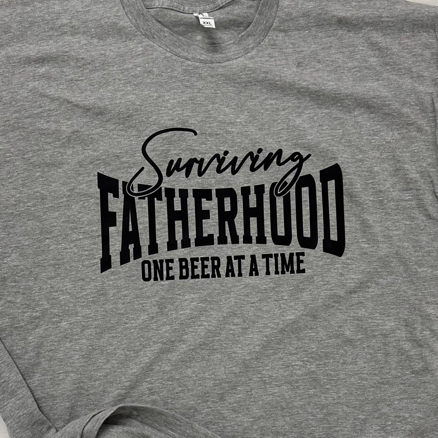 Surviving Fatherhood Graphic Tee