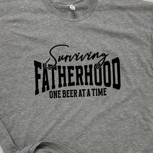 Surviving Fatherhood Graphic Tee